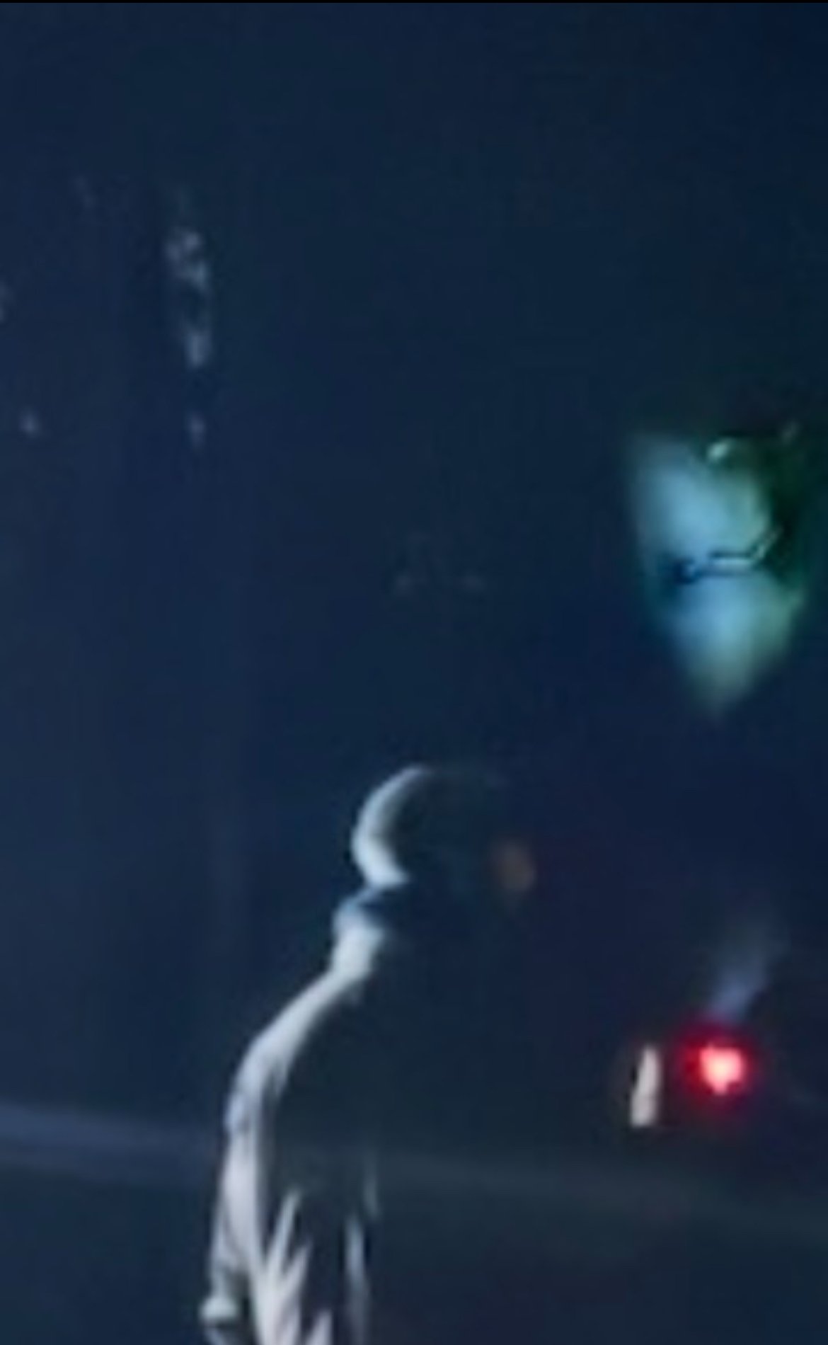 Second ghost hunt photograph showing what appears to be a face inside the blue glow